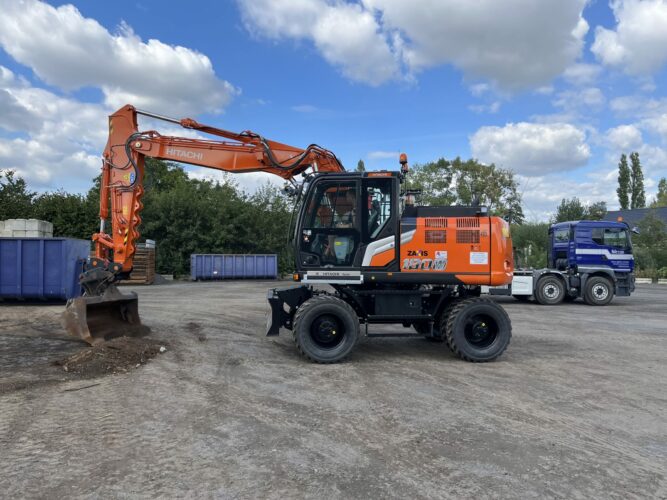 Pladdet Hitachi ZX180W-7 2P mobiele graafmachine